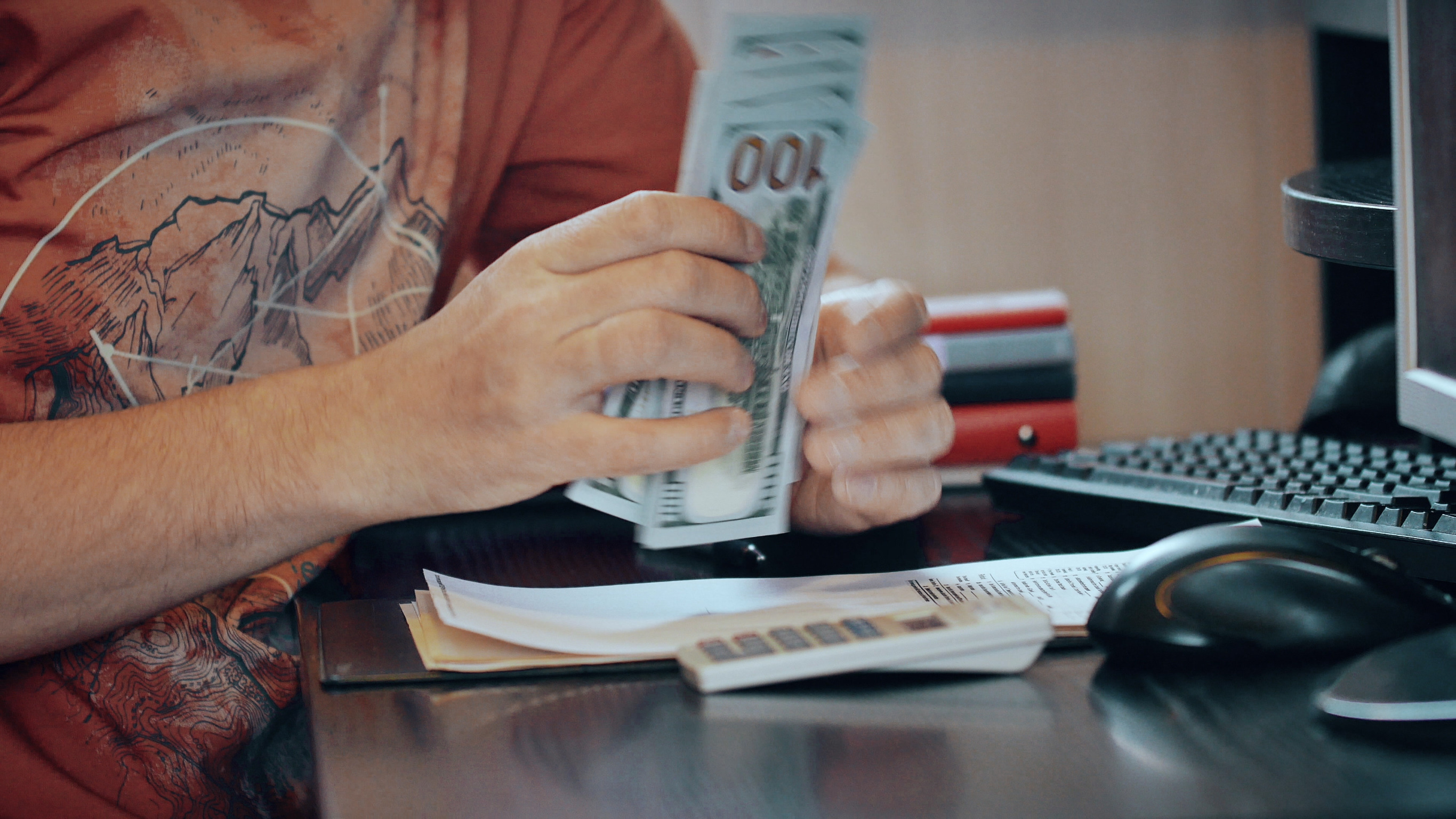 man counting money